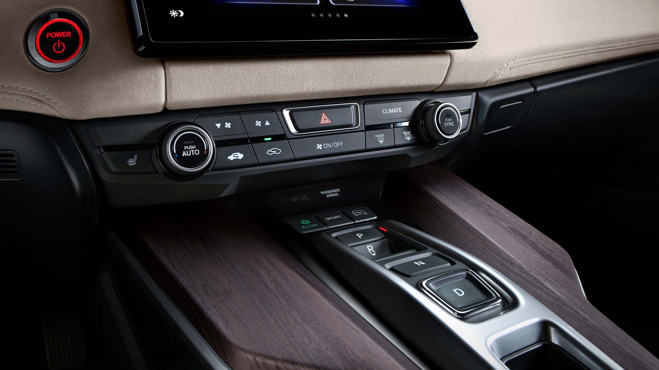 Detail of dual-zone automatic climate controls on center console.